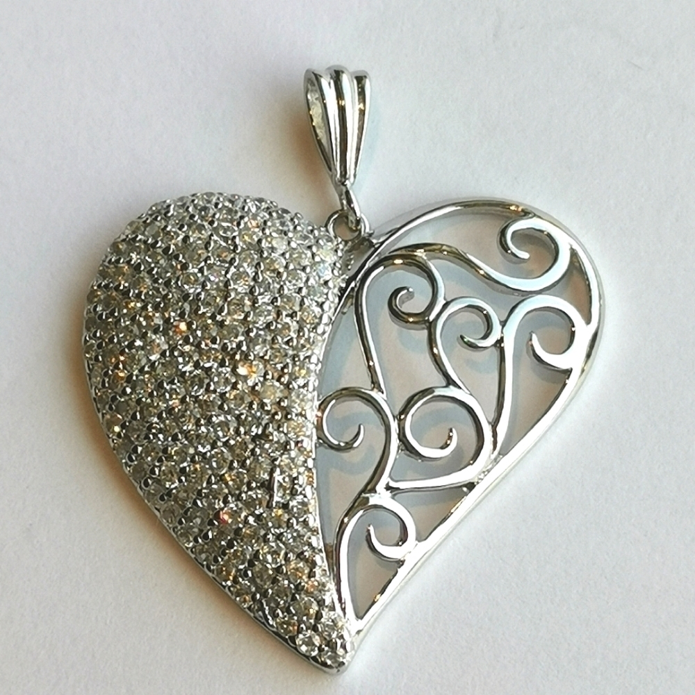 Heart pendant in Sterling Silver filigree and pave set cz